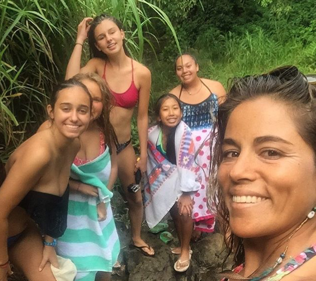 Hiking to a waterfall with surf coach and activity leader Kiki!